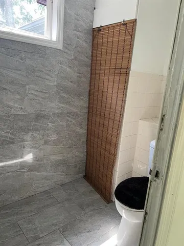 a view of entry way with wooden door