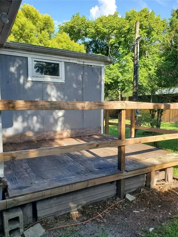 a view of a yard and front view of a house