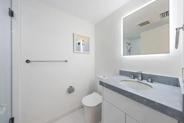 a street sign on the side of a building