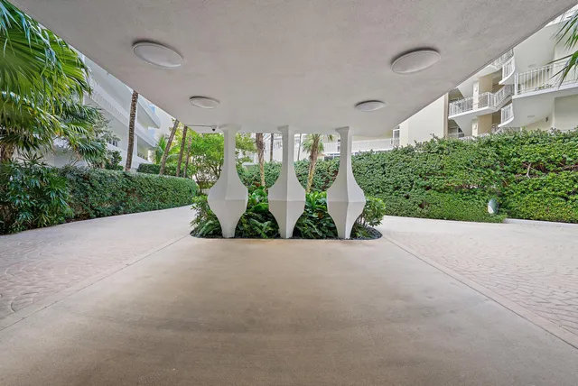 a view of a chairs and table in the patio