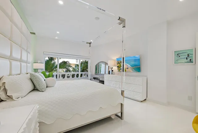 a bathroom with a granite countertop sink mirror and double