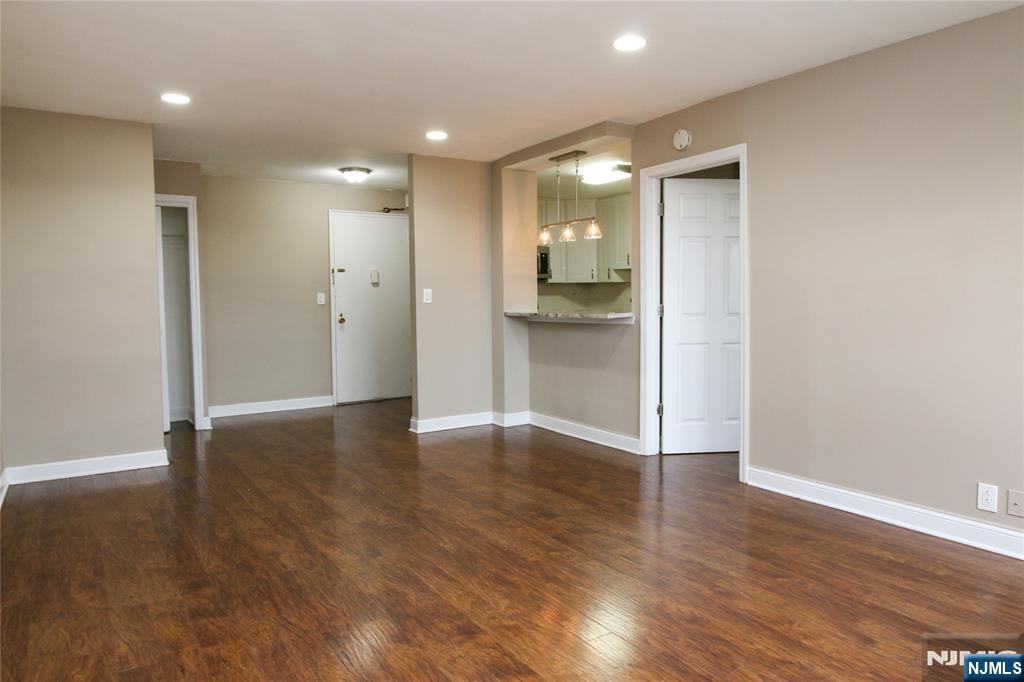 39 East 39th Street, Unit 412 Paterson, NJ 07514 - Photo 14 of 21 a view of empty room with wooden floor