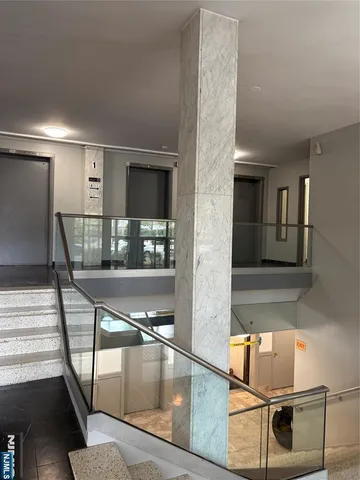 a view of swimming pool with outdoor seating