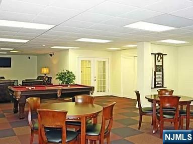39 East 39th Street, Unit 412 Paterson, NJ 07514 - Photo 9 of 21 a view of a dining room with furniture
