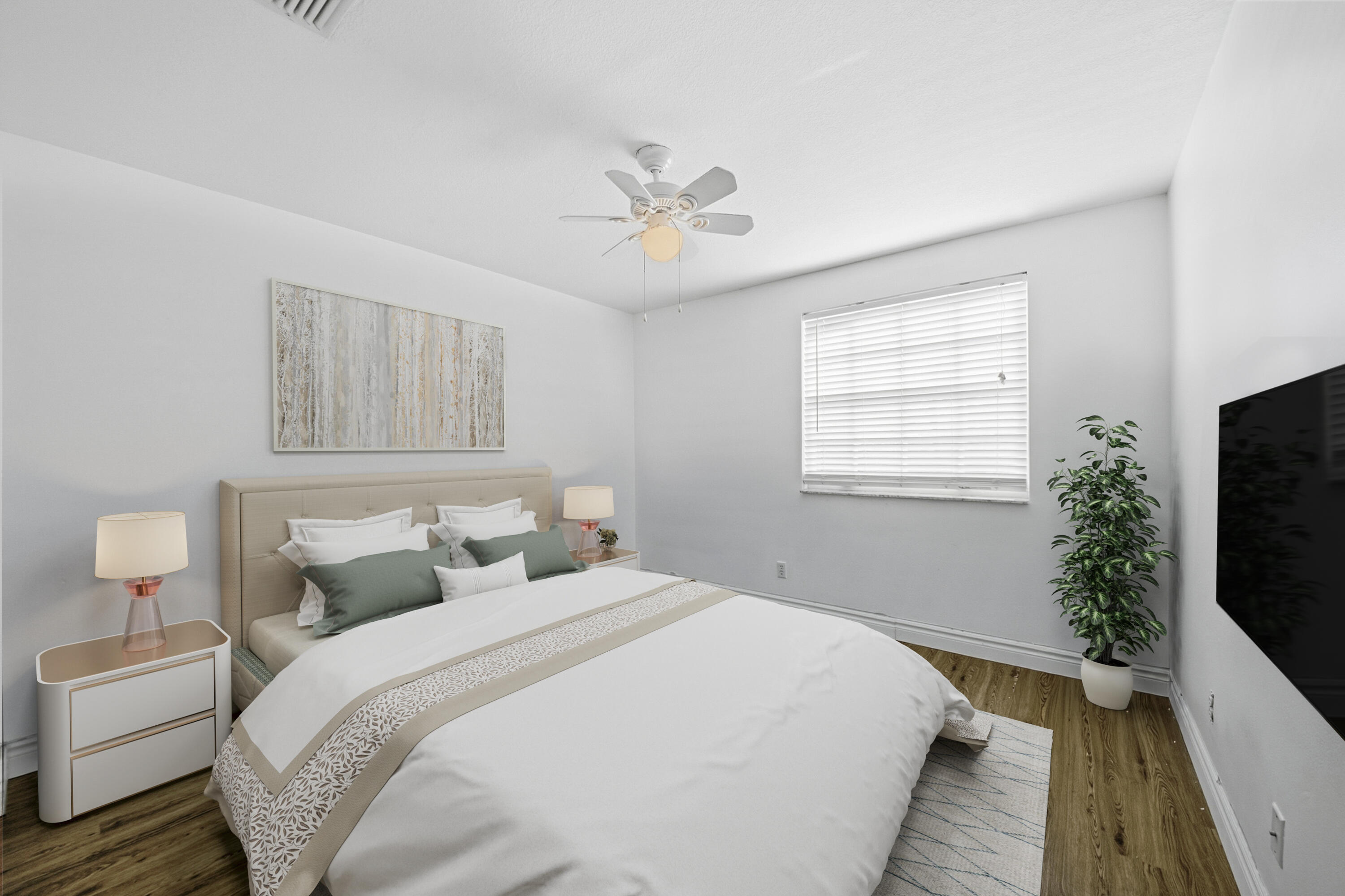 8021 Stirrup Cay Court Boynton Beach, FL 33436 - Photo 14 of 23 a bedroom with a bed and a flat screen tv