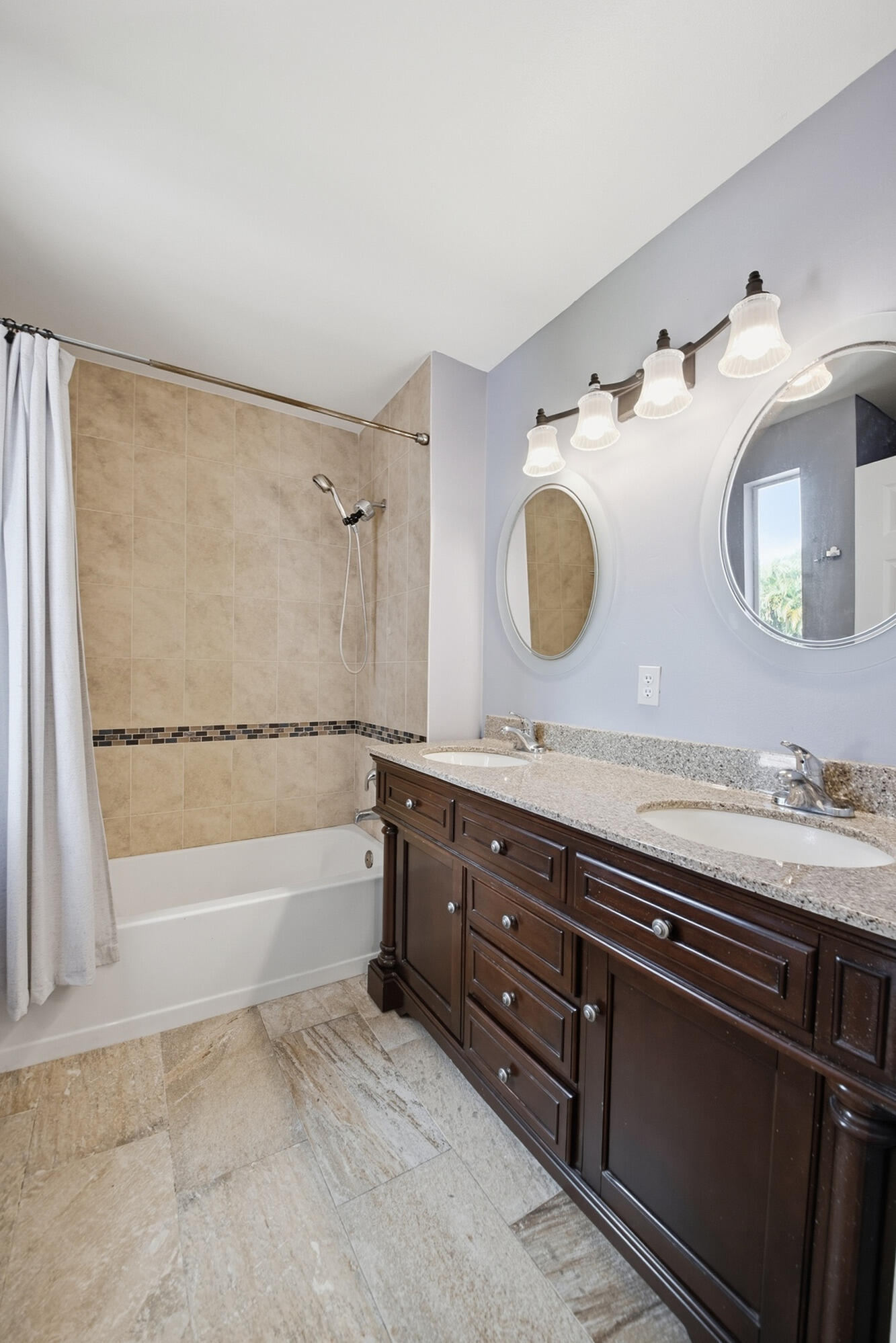 8021 Stirrup Cay Court Boynton Beach, FL 33436 - Photo 17 of 23 a bathroom with a tub sink and mirror