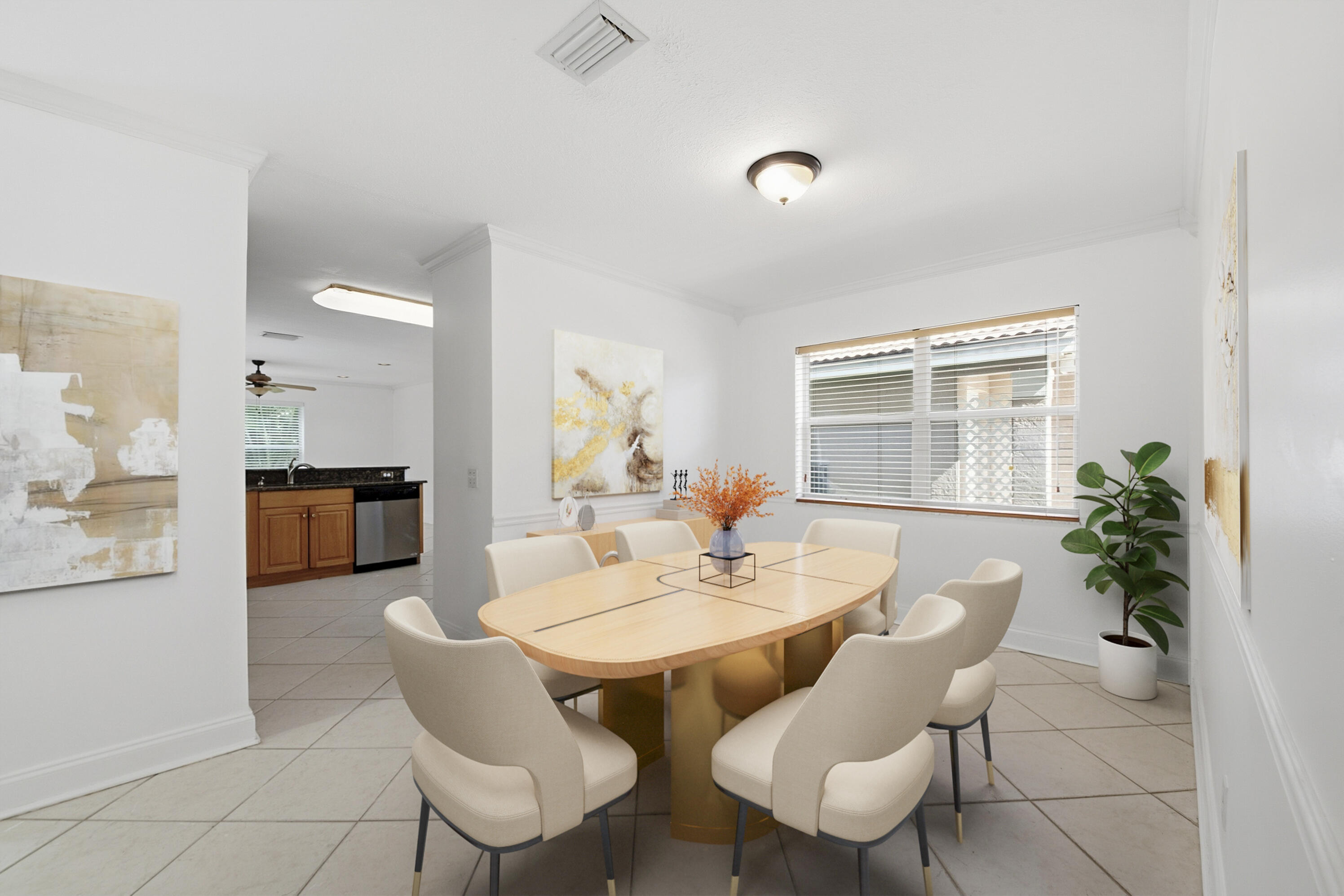 8021 Stirrup Cay Court Boynton Beach, FL 33436 - Photo 6 of 23 a view of a dining room with furniture and a potted plant