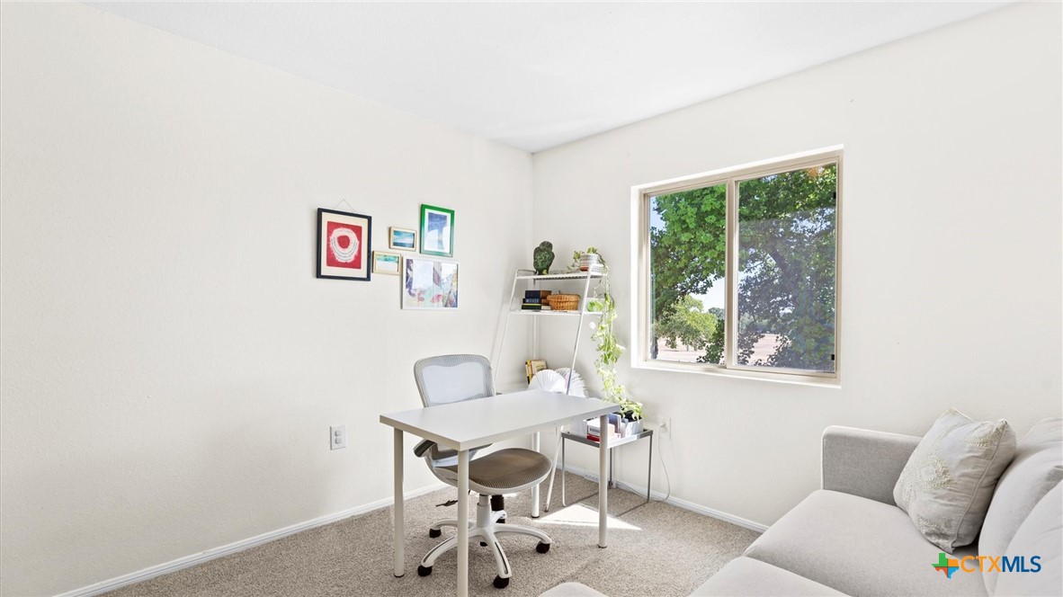 9739 Wagon Train Converse, TX 78109 - Photo 16 of 29 a living room with furniture and a window