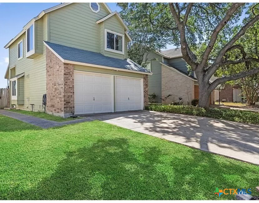 9739 Wagon Train Converse, TX 78109 - Photo 3 of 29 a view of a house with a yard