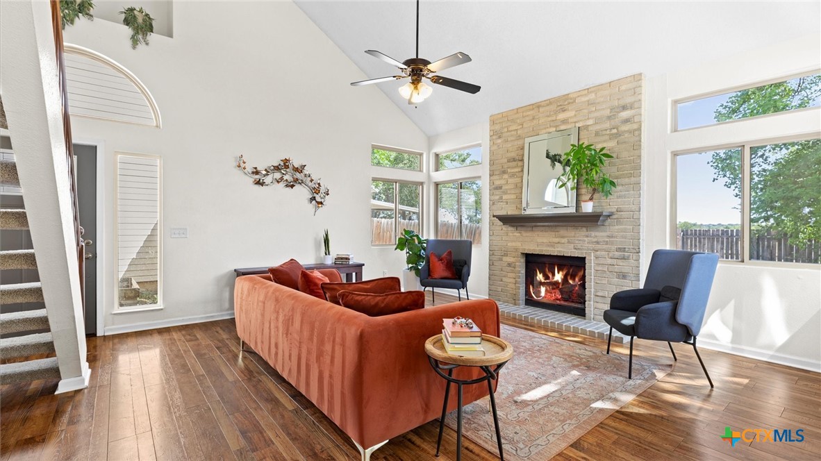 9739 Wagon Train Converse, TX 78109 - Photo 6 of 29 a living room with furniture and a fireplace
