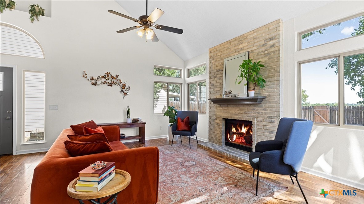 9739 Wagon Train Converse, TX 78109 - Photo 7 of 29 a living room with furniture and a fireplace