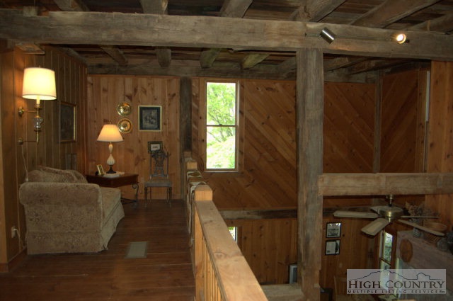 123 John Griffith Road Lansing, NC 28643 - Photo 3 of 21 a living room with furniture and a window