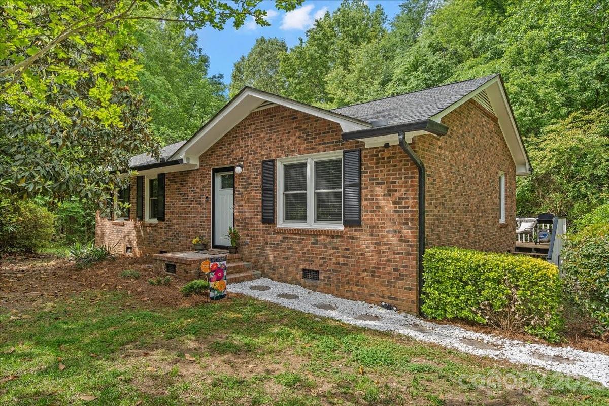 1525 Reservation Road Rock Hill, SC 29730 - Photo 1 of 31 a backyard of a house with table and chairs
