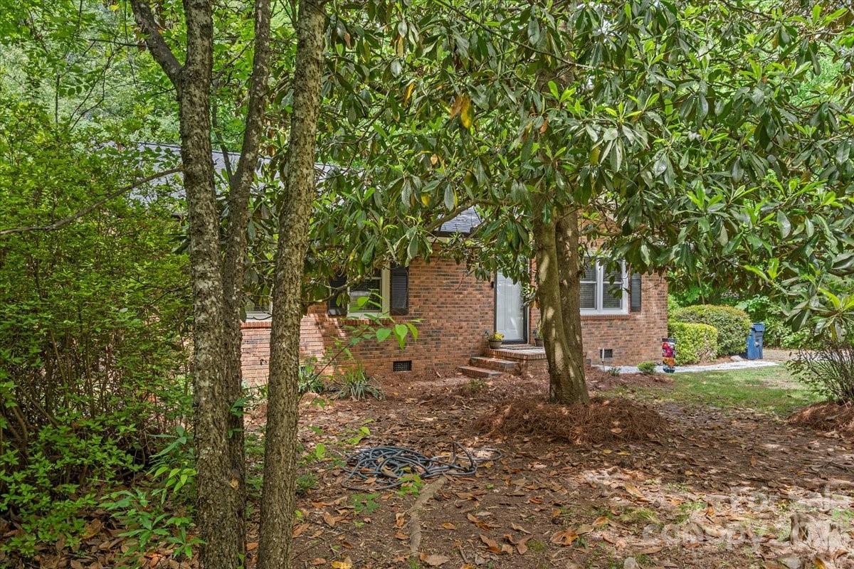 1525 Reservation Road Rock Hill, SC 29730 - Photo 28 of 31 a backyard of a house with lots of green space