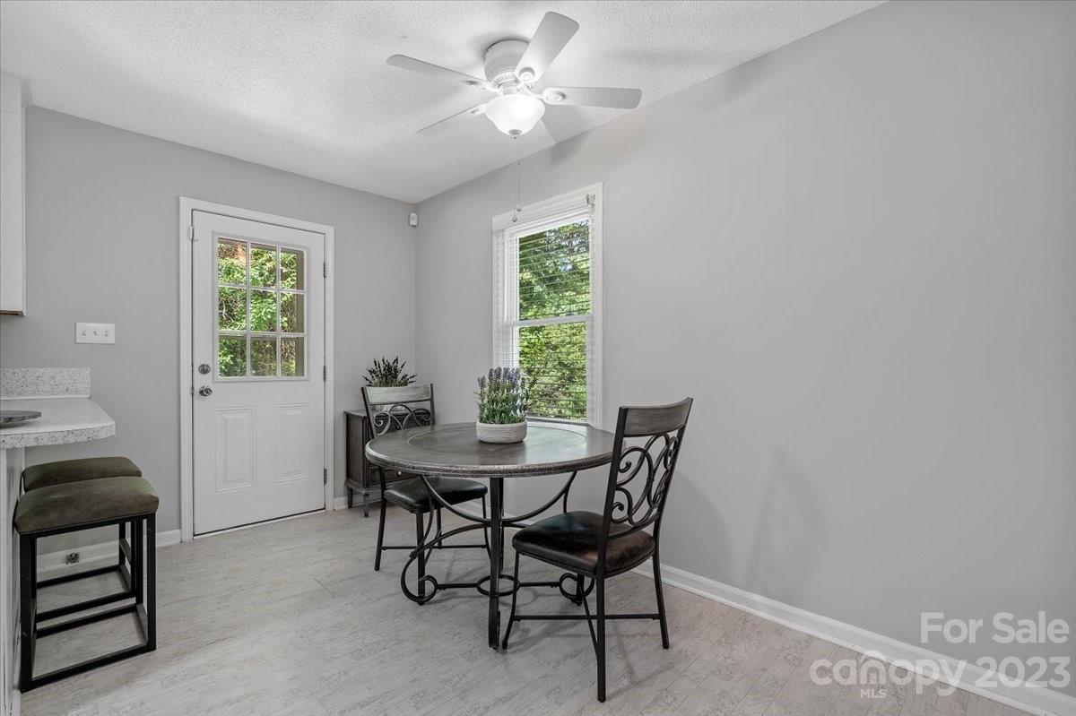 1525 Reservation Road Rock Hill, SC 29730 - Photo 9 of 31 a view of a dining room with furniture and a window