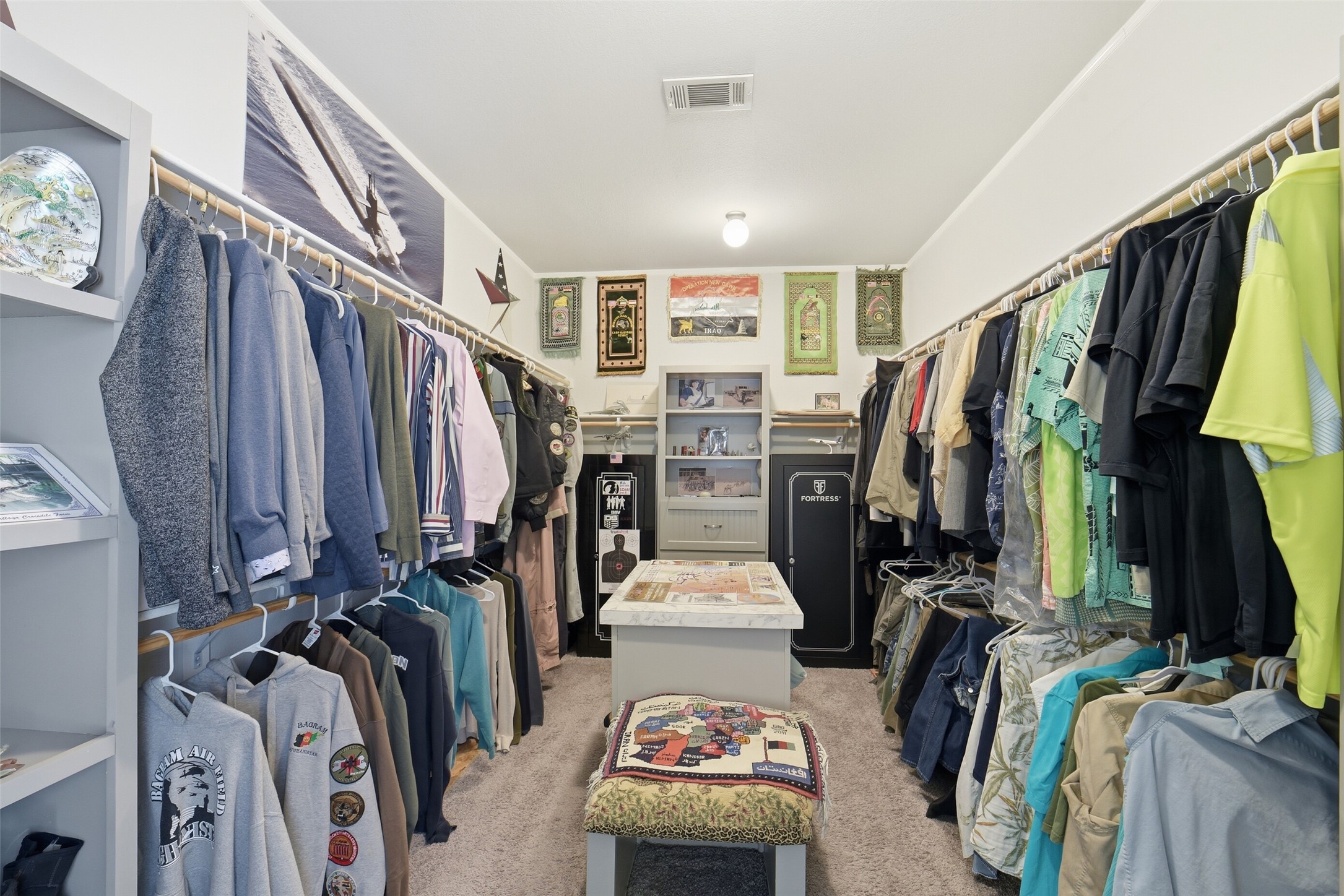 4007 Nancy Lane, Unit C546B Rosharon, TX 77583 - Photo 37 of 50 a view of walk in closet with clothes and shoes