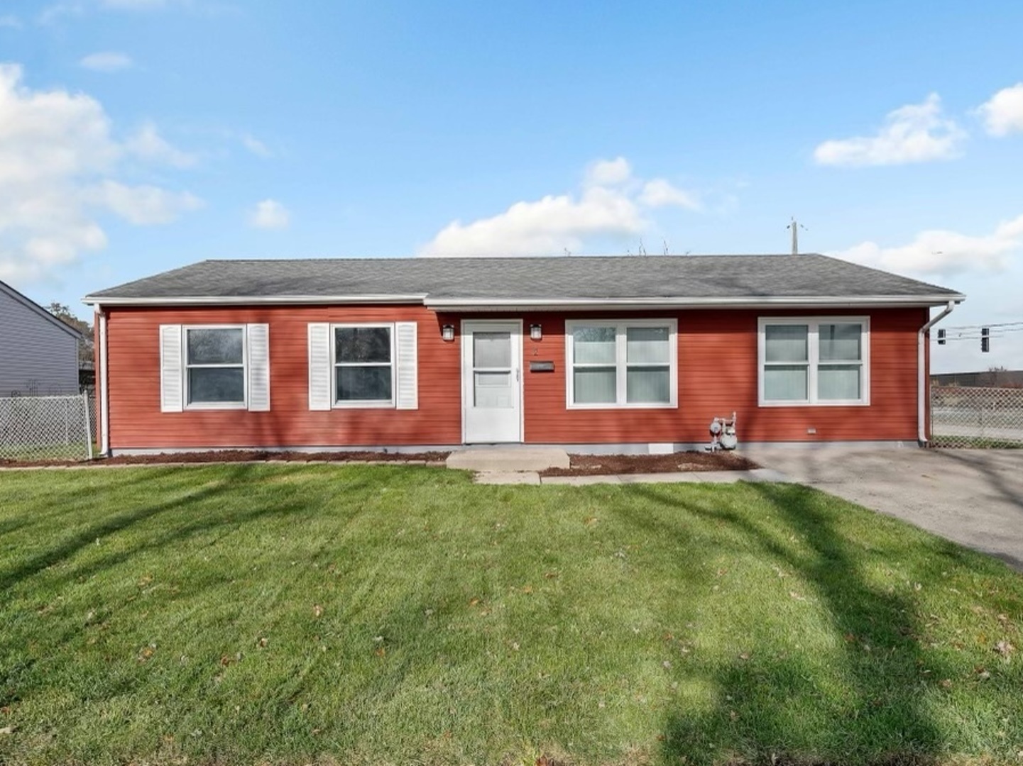2 Concord Avenue Romeoville, IL 60446 - Photo 1 of 15 a front view of a house with a garden