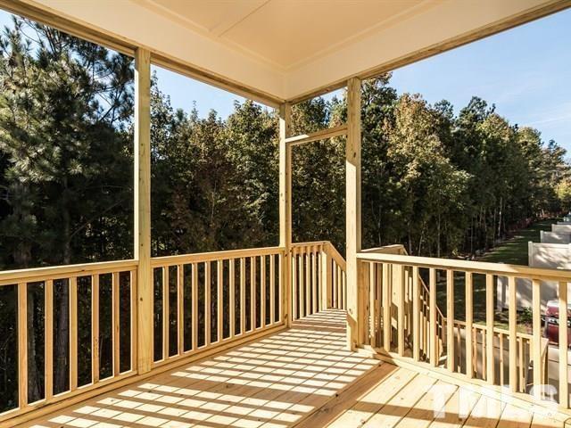 256 Alamosa Place Cary, NC 27519 - Photo 5 of 16 a view of a wooden deck