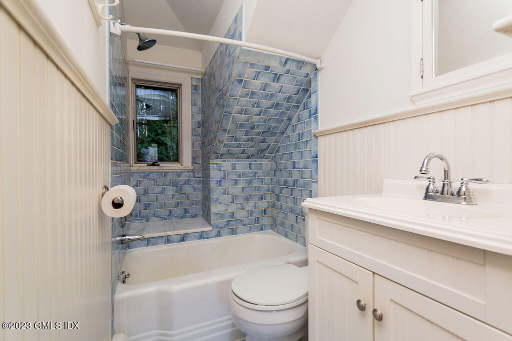 41 B Byram Shore Road Greenwich, CT 06830 - Photo 11 of 16 a bathroom with a sink a toilet and shower