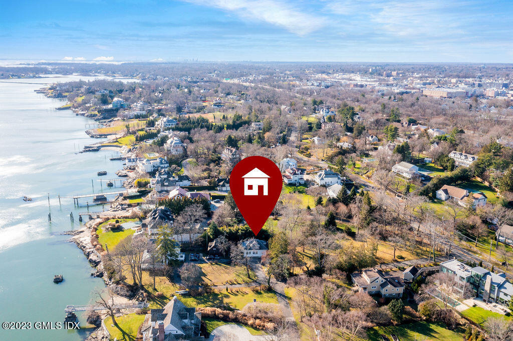 41 B Byram Shore Road Greenwich, CT 06830 - Photo 13 of 16 an aerial view of a house with a swimming pool yard and outdoor seating