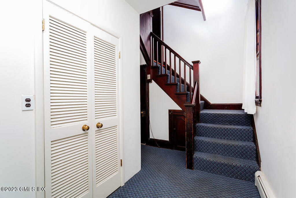 41 B Byram Shore Road Greenwich, CT 06830 - Photo 3 of 16 a view of entryway with wooden floor and stairs