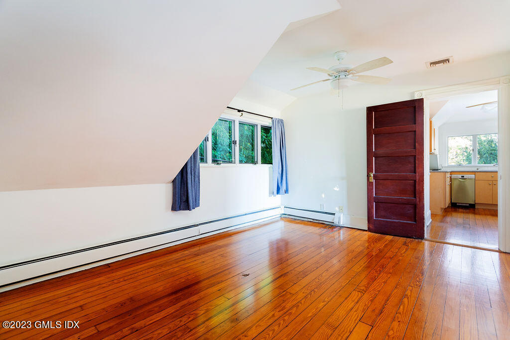 41 B Byram Shore Road Greenwich, CT 06830 - Photo 10 of 16 wooden floor in an empty room with a window