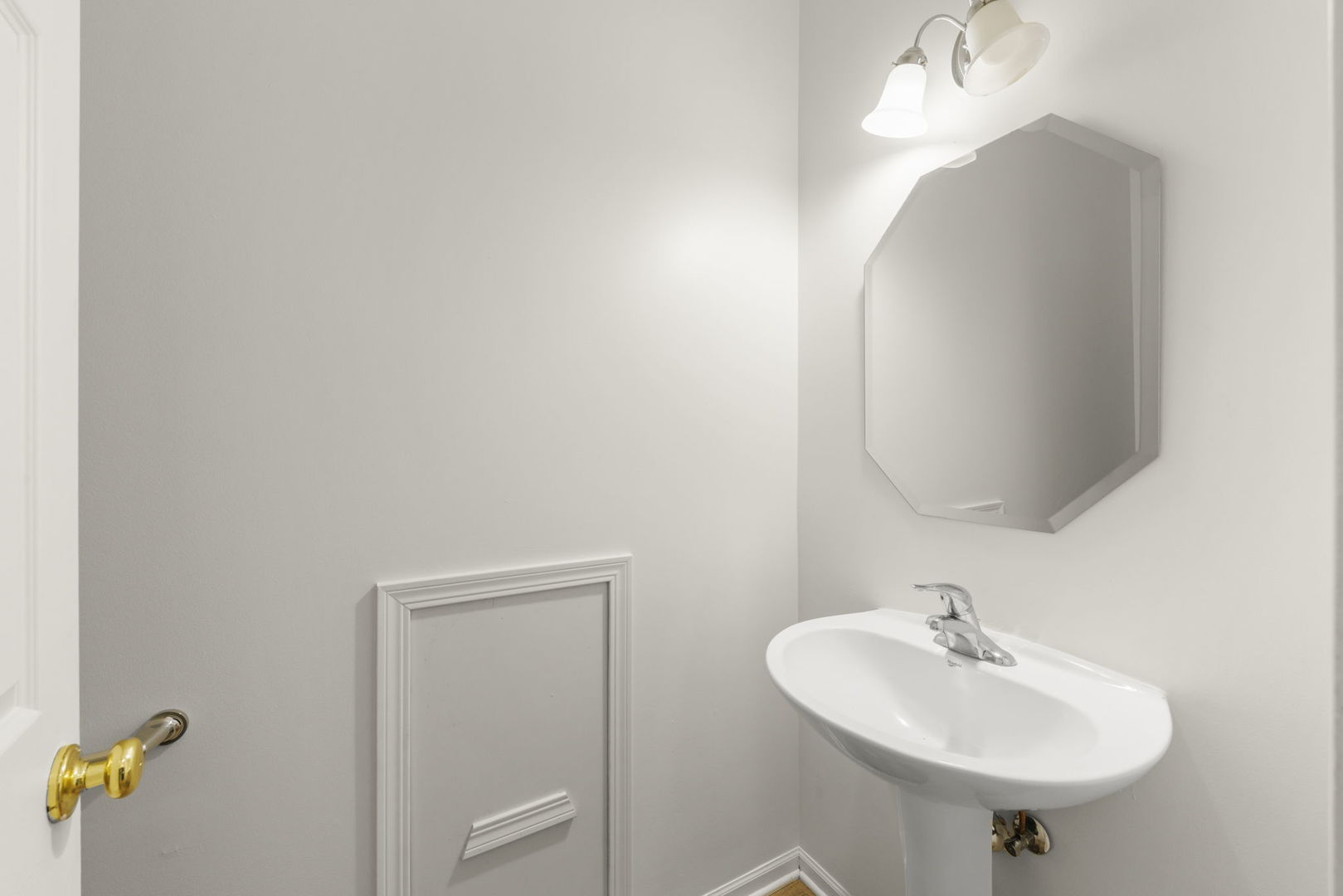 3770 Pope Court Plano, IL 60545 - Photo 11 of 25 a bathroom with a sink and a mirror