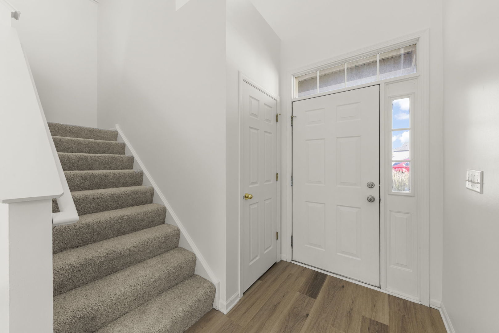 3770 Pope Court Plano, IL 60545 - Photo 13 of 25 a view of entryway with stairs