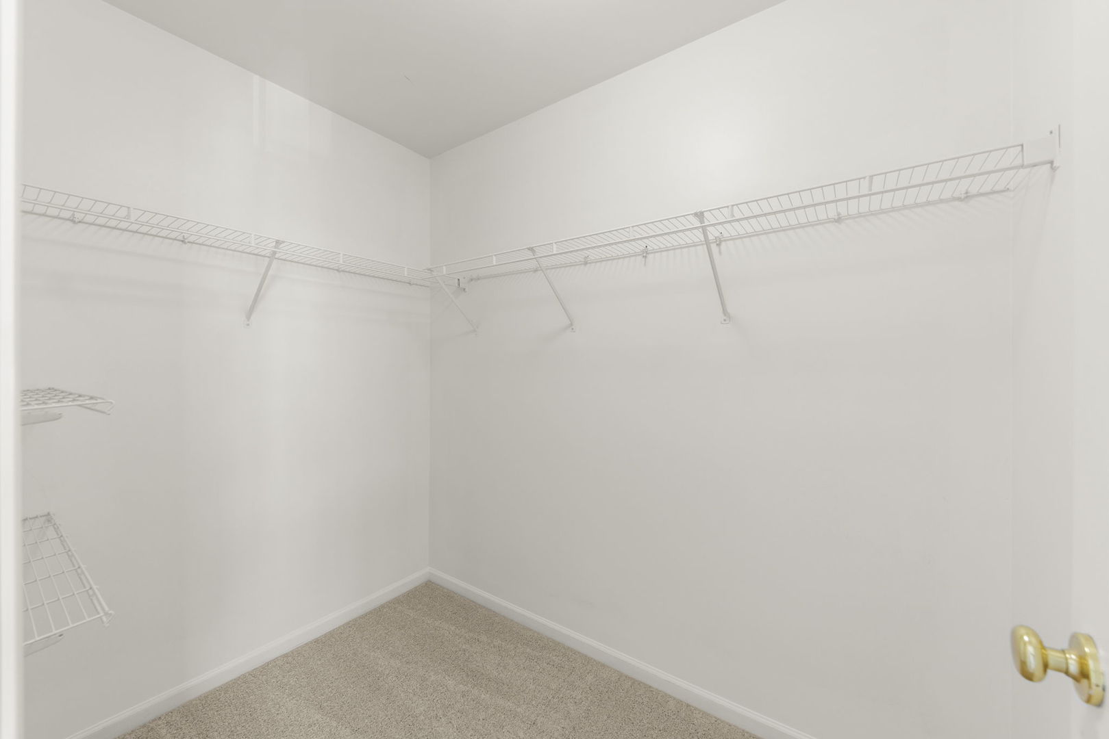 3770 Pope Court Plano, IL 60545 - Photo 17 of 25 a view of a room with racks on the wall