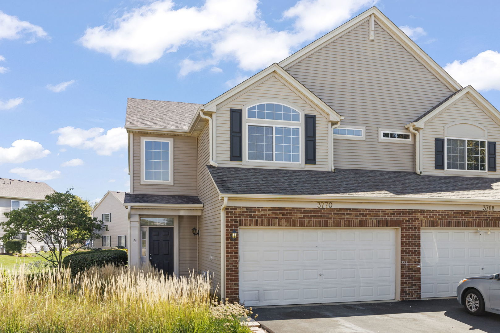 3770 Pope Court Plano, IL 60545 - Photo 2 of 25 a view of a house with a yard