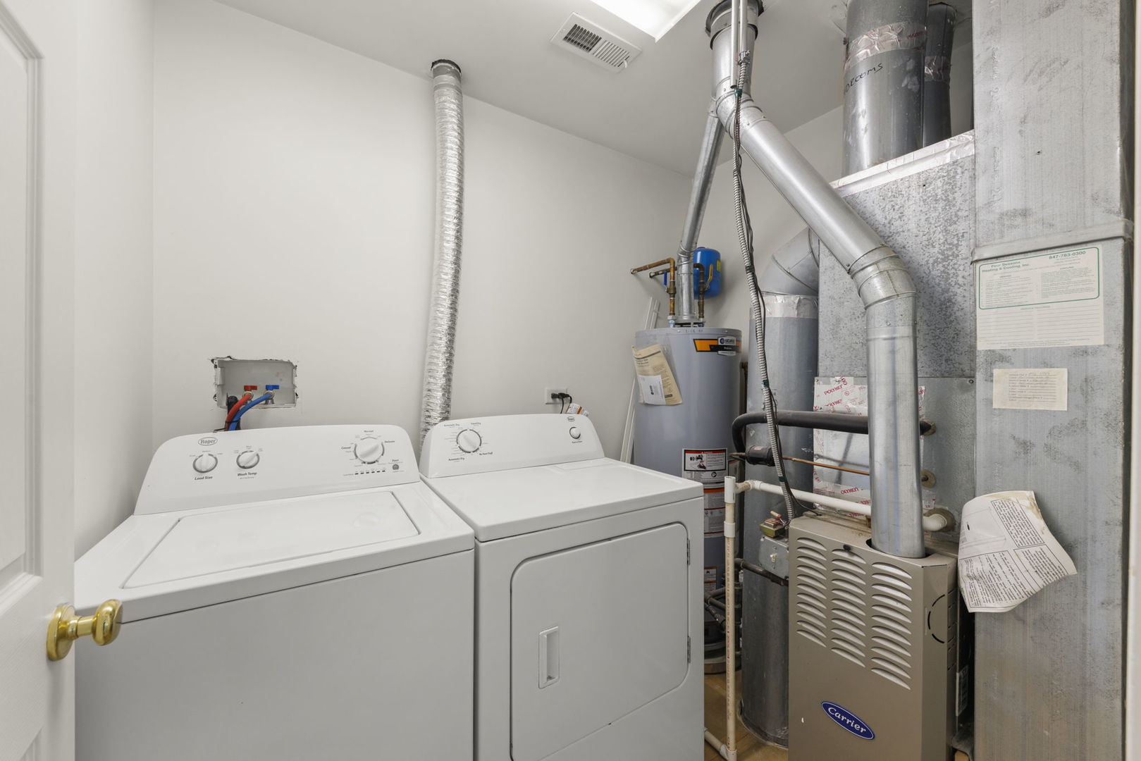 3770 Pope Court Plano, IL 60545 - Photo 22 of 25 a utility room with dryer and washer