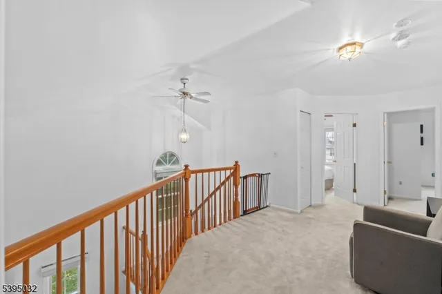 a view of a hallway with workspace