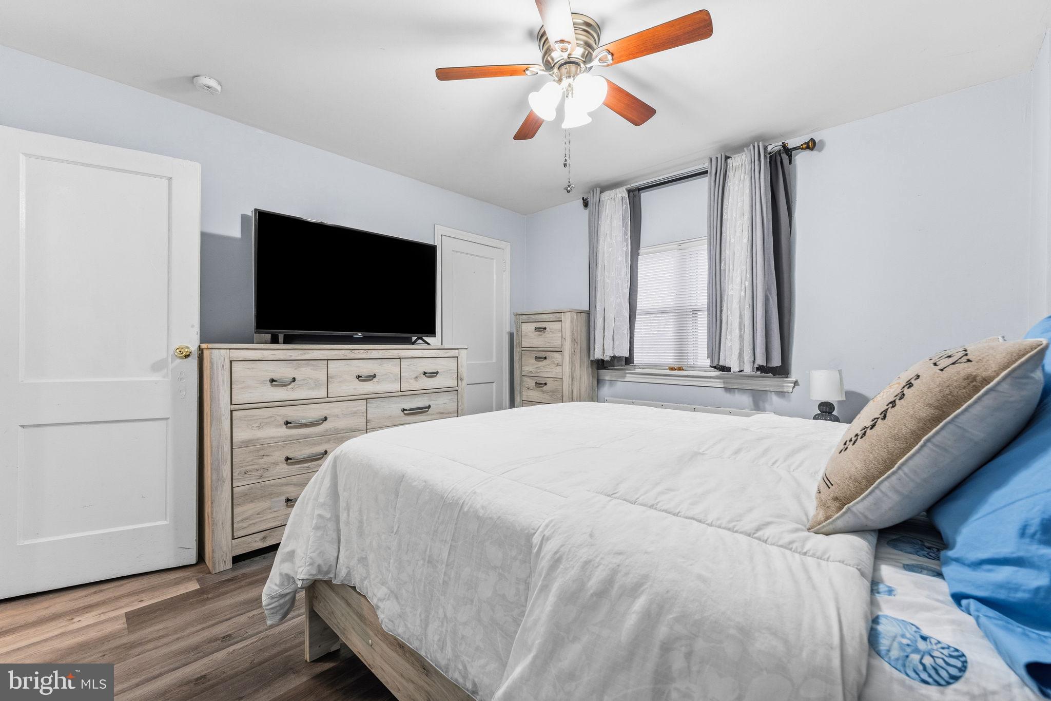 540 Snowden Road Upper Darby, PA 19082 - Photo 13 of 30 a bedroom with a bed and a flat screen tv