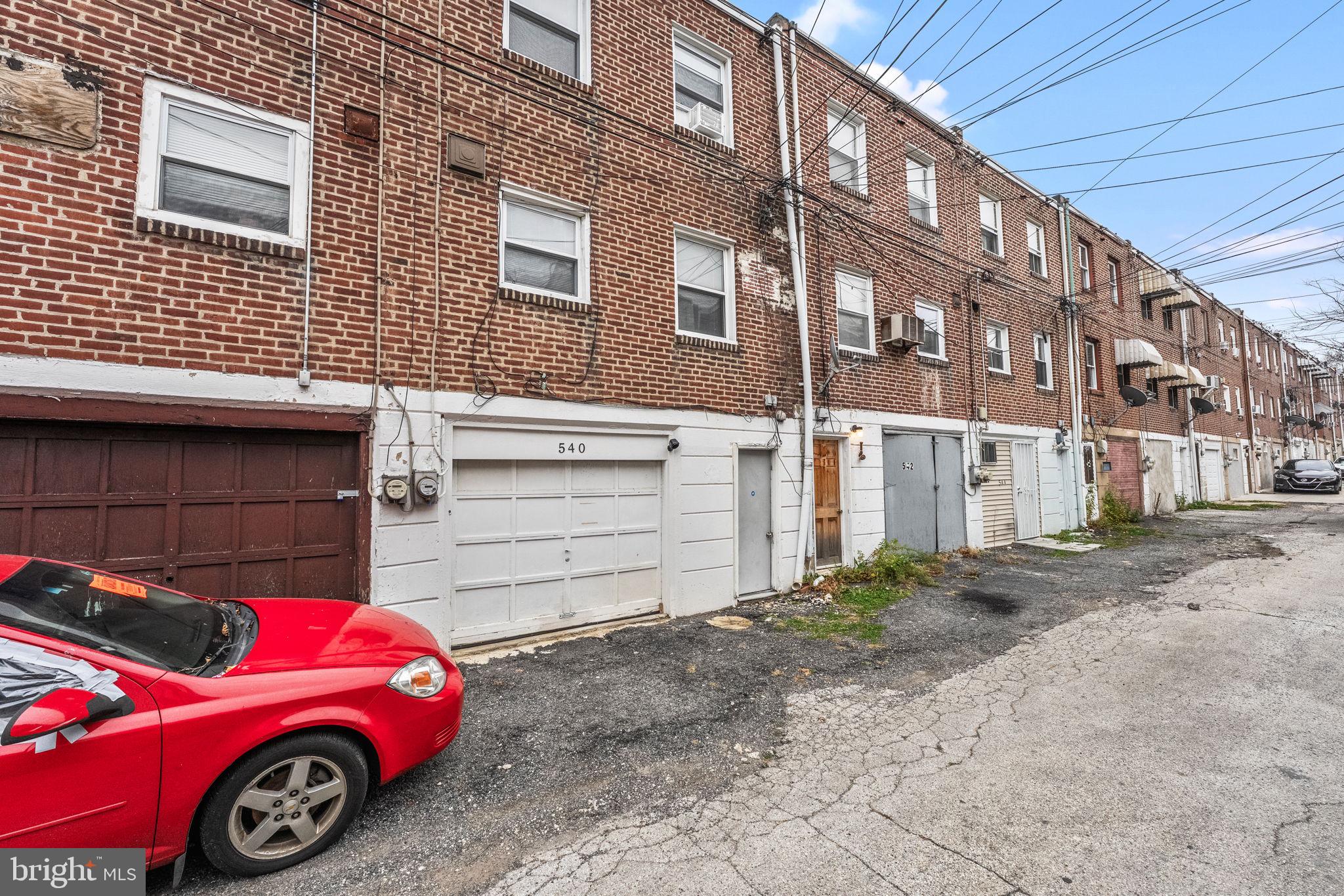 540 Snowden Road Upper Darby, PA 19082 - Photo 27 of 30 a car parked in front of a building