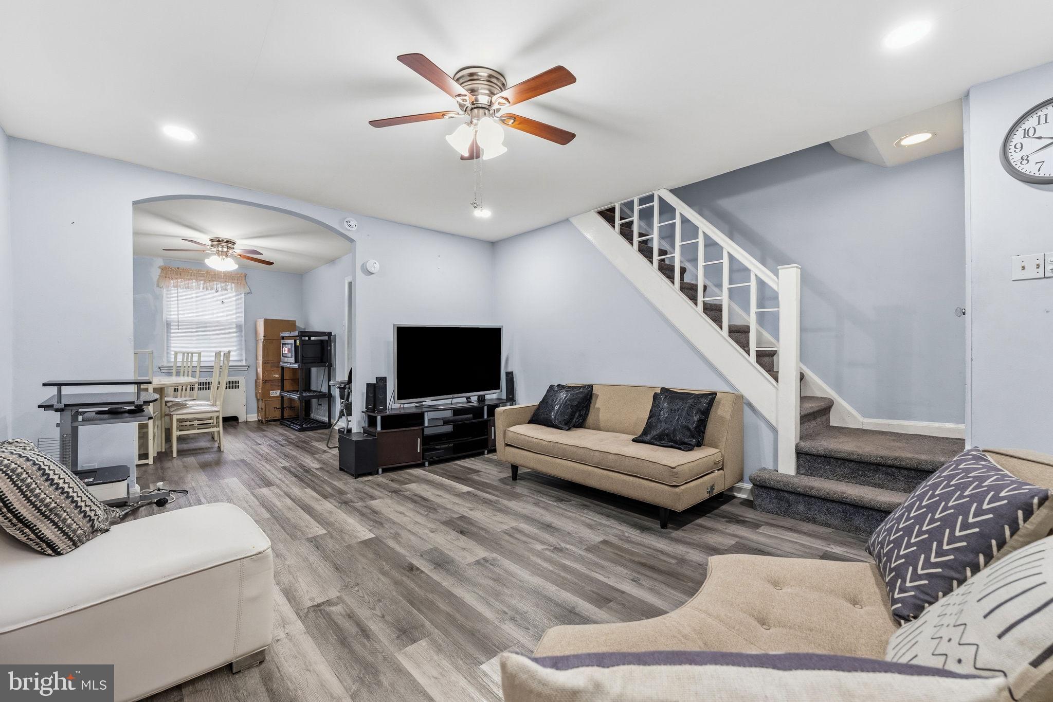 540 Snowden Road Upper Darby, PA 19082 - Photo 3 of 30 a living room with furniture and a flat screen tv