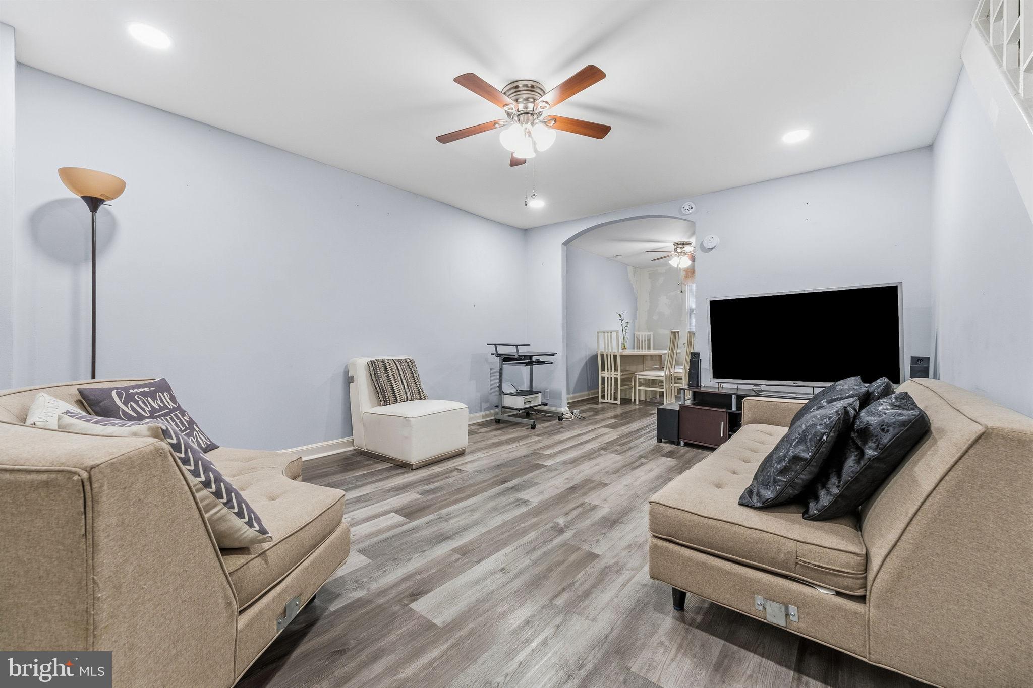 540 Snowden Road Upper Darby, PA 19082 - Photo 4 of 30 a living room with furniture and a flat screen tv