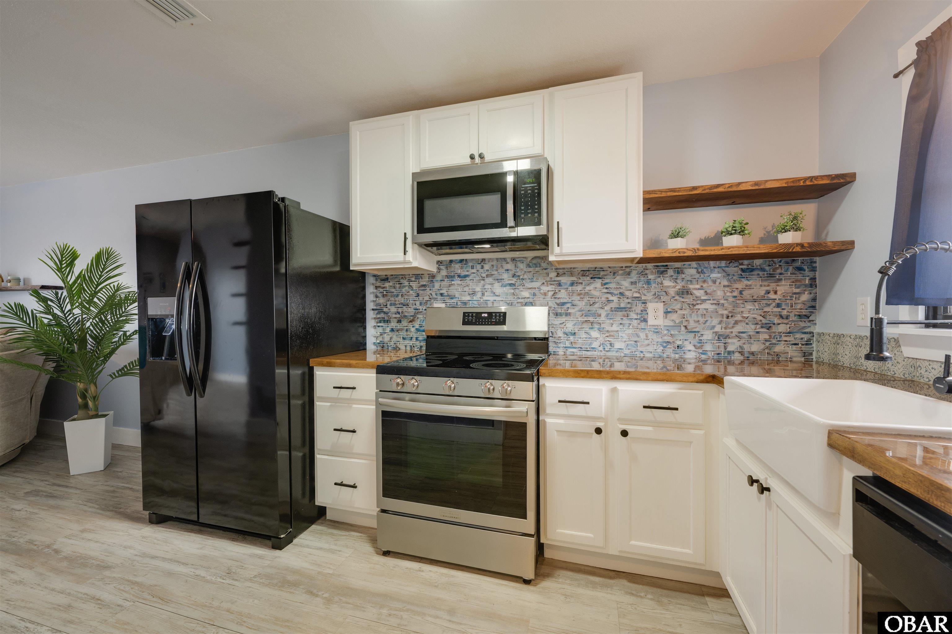 128 West Kitty Hawk Road, Unit B5 Kitty Hawk, NC 27949 - Photo 3 of 36 Gallery Image 3
