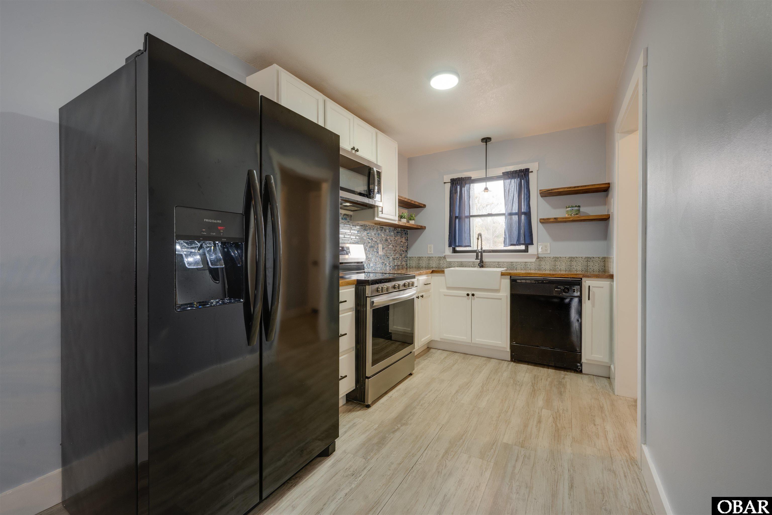 128 West Kitty Hawk Road, Unit B5 Kitty Hawk, NC 27949 - Photo 5 of 36 Gallery Image 5