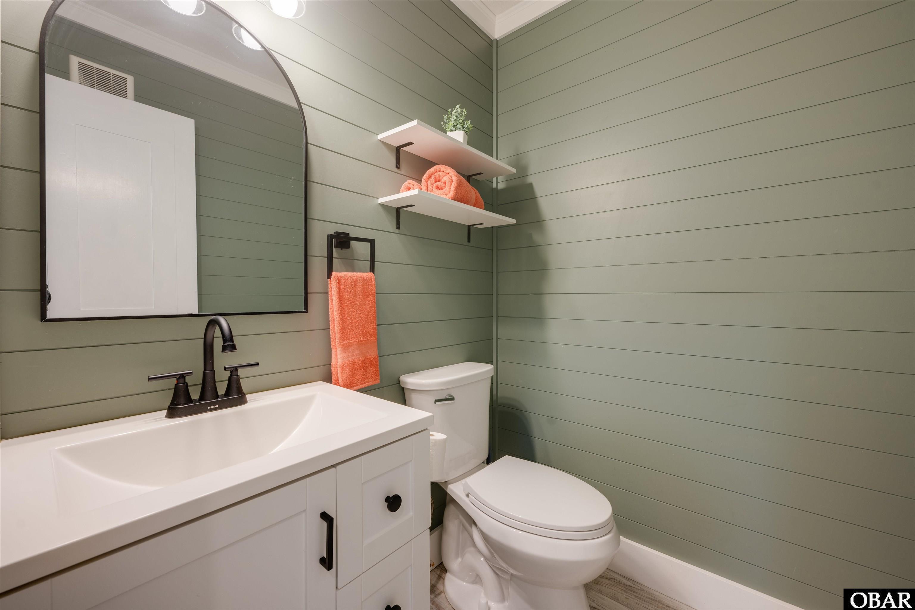 128 West Kitty Hawk Road, Unit B5 Kitty Hawk, NC 27949 - Photo 10 of 36 1st floor half bath