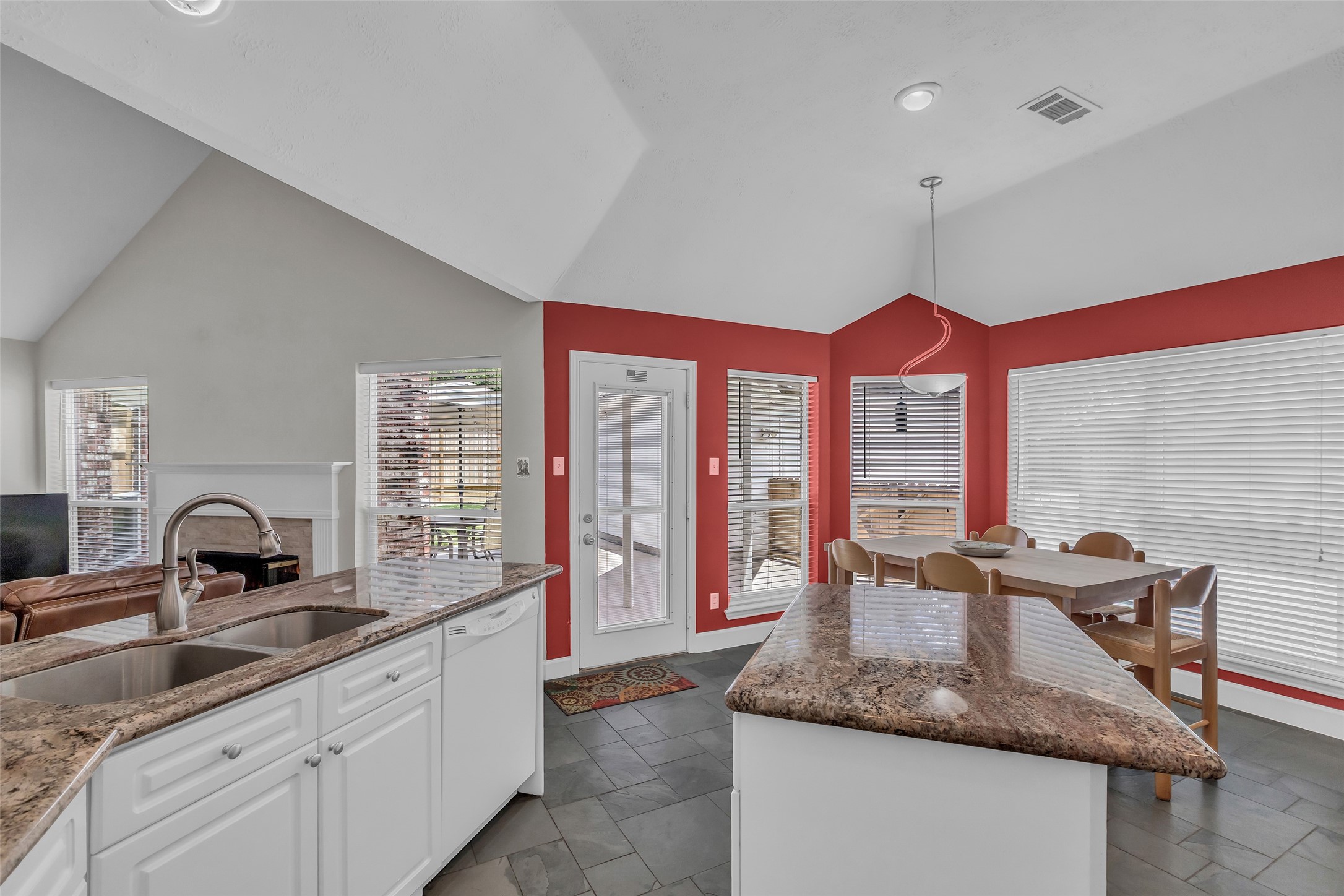 326 North Cypress Estates Circle Spring, TX 77388 - Photo 21 of 39 a kitchen with stainless steel appliances granite countertop a sink and a large window