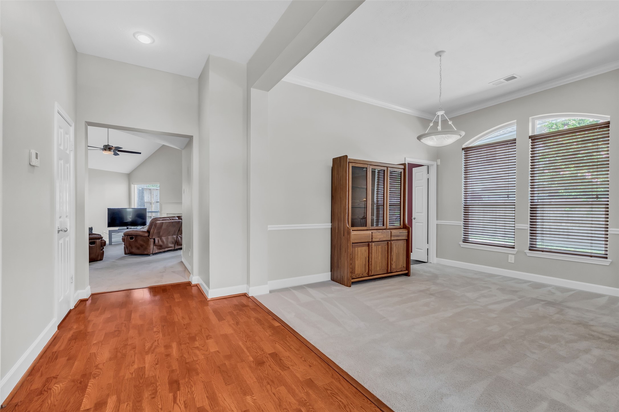 326 North Cypress Estates Circle Spring, TX 77388 - Photo 5 of 39 a large bedroom with a bed and wooden floor