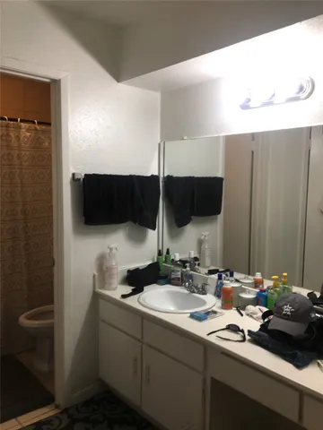 a bedroom with a bed and a closet