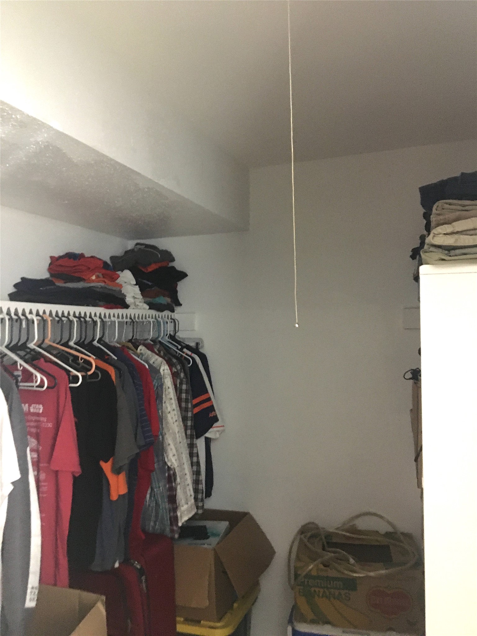 5625 Antoine Drive, Unit 607 Houston, TX 77091 - Photo 13 of 15 a bedroom with a bed and a closet