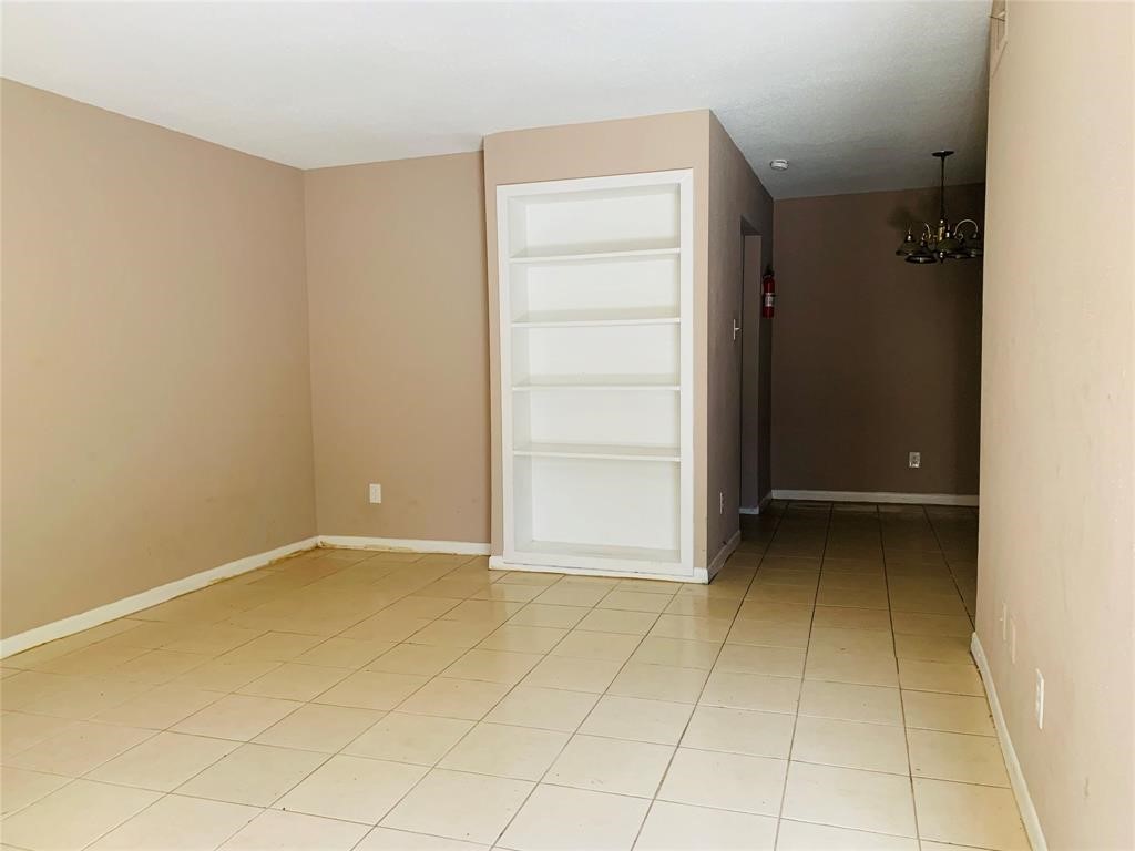 5625 Antoine Drive, Unit 607 Houston, TX 77091 - Photo 8 of 15 an empty room with closet