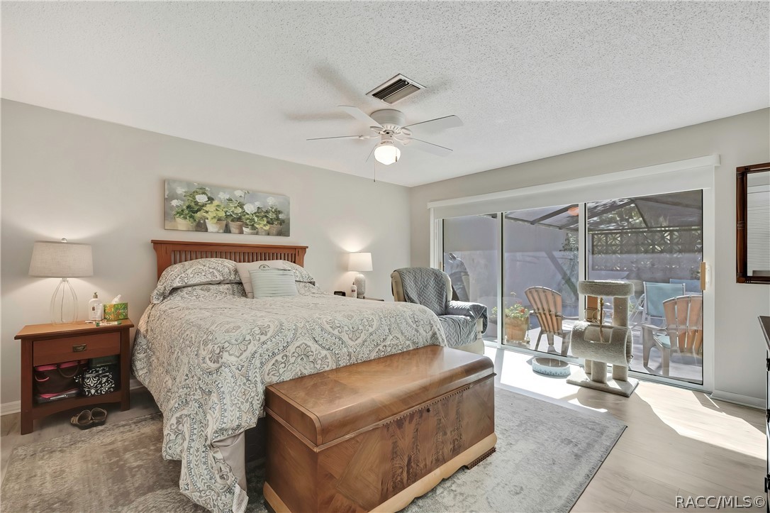 2 Quail Run Homosassa, FL 34446 - Photo 22 of 36 Primary bedroom has access to rear lanai
