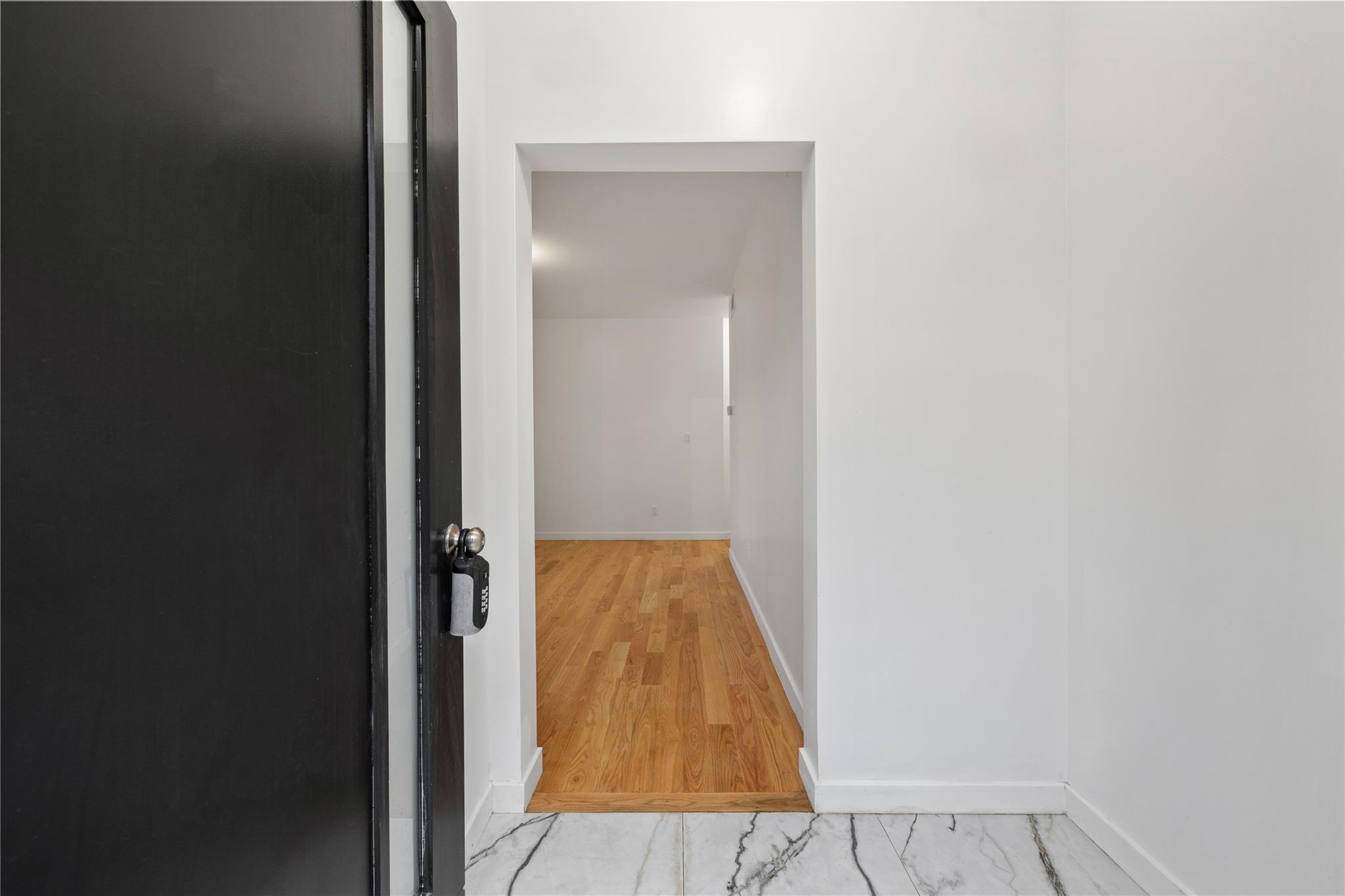 151 Blauvelt Road, Unit 116 Monsey, NY 10952 - Photo 2 of 12 a view of hallway with wooden floor