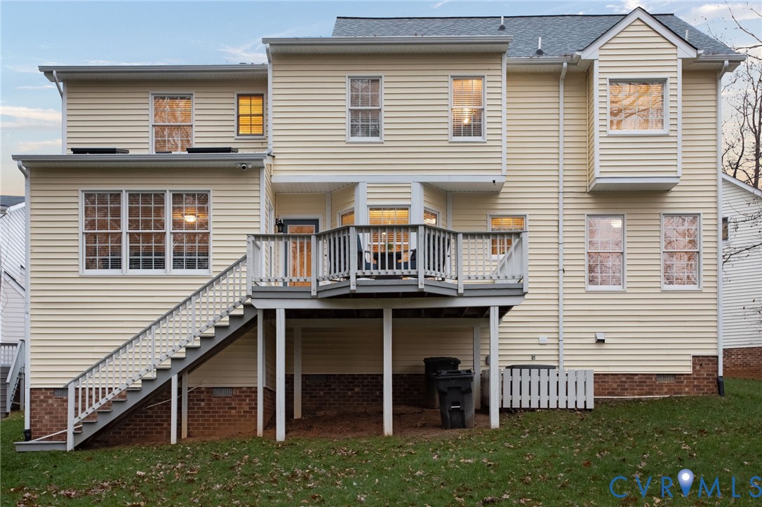 13914 Sagebrook Road Midlothian, VA 23112 - Photo 33 of 49 a view of a house with a chairs on the deck