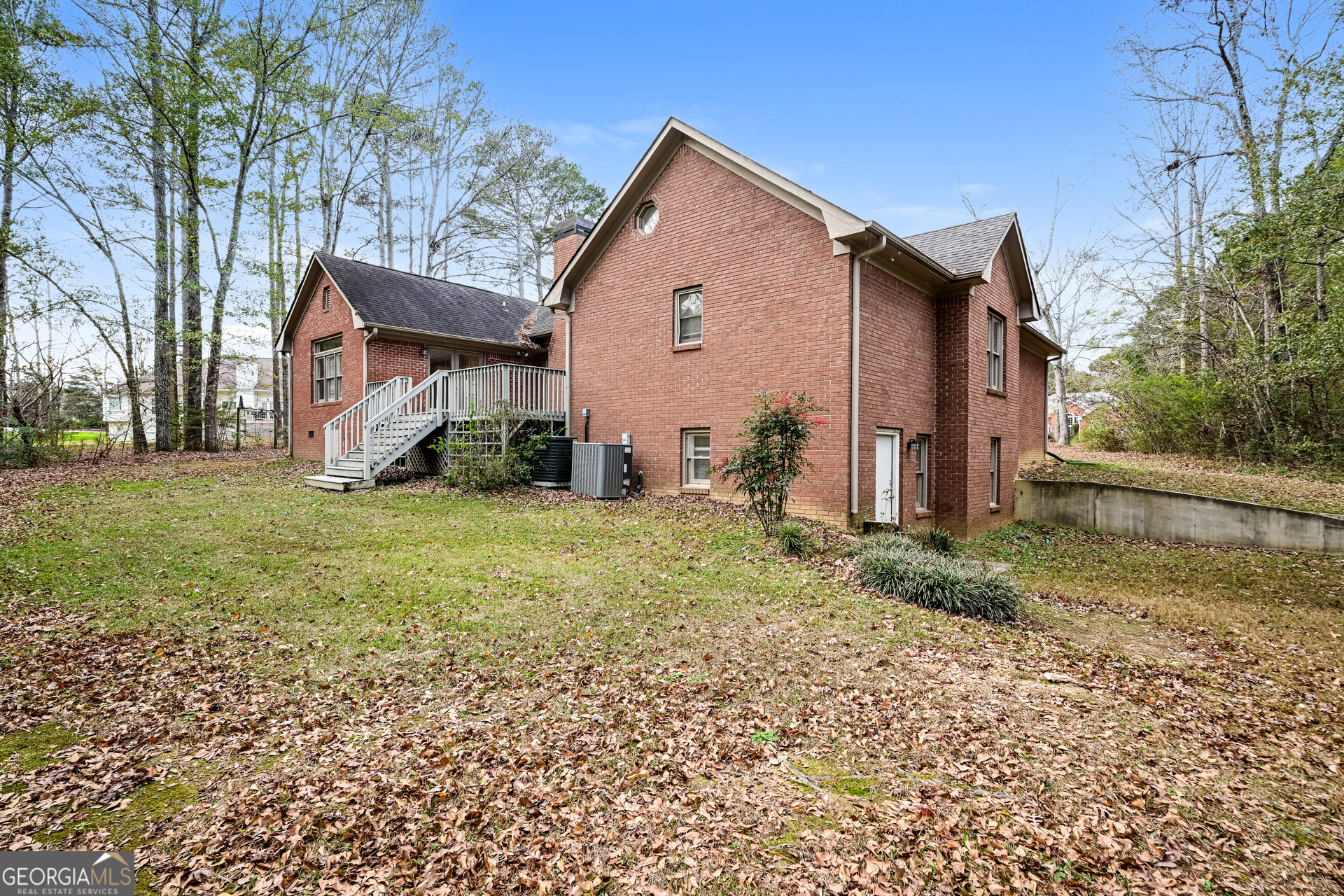 100 Red Maple Drive Hampton, GA 30228 - Photo 15 of 22 a view of a house with a yard