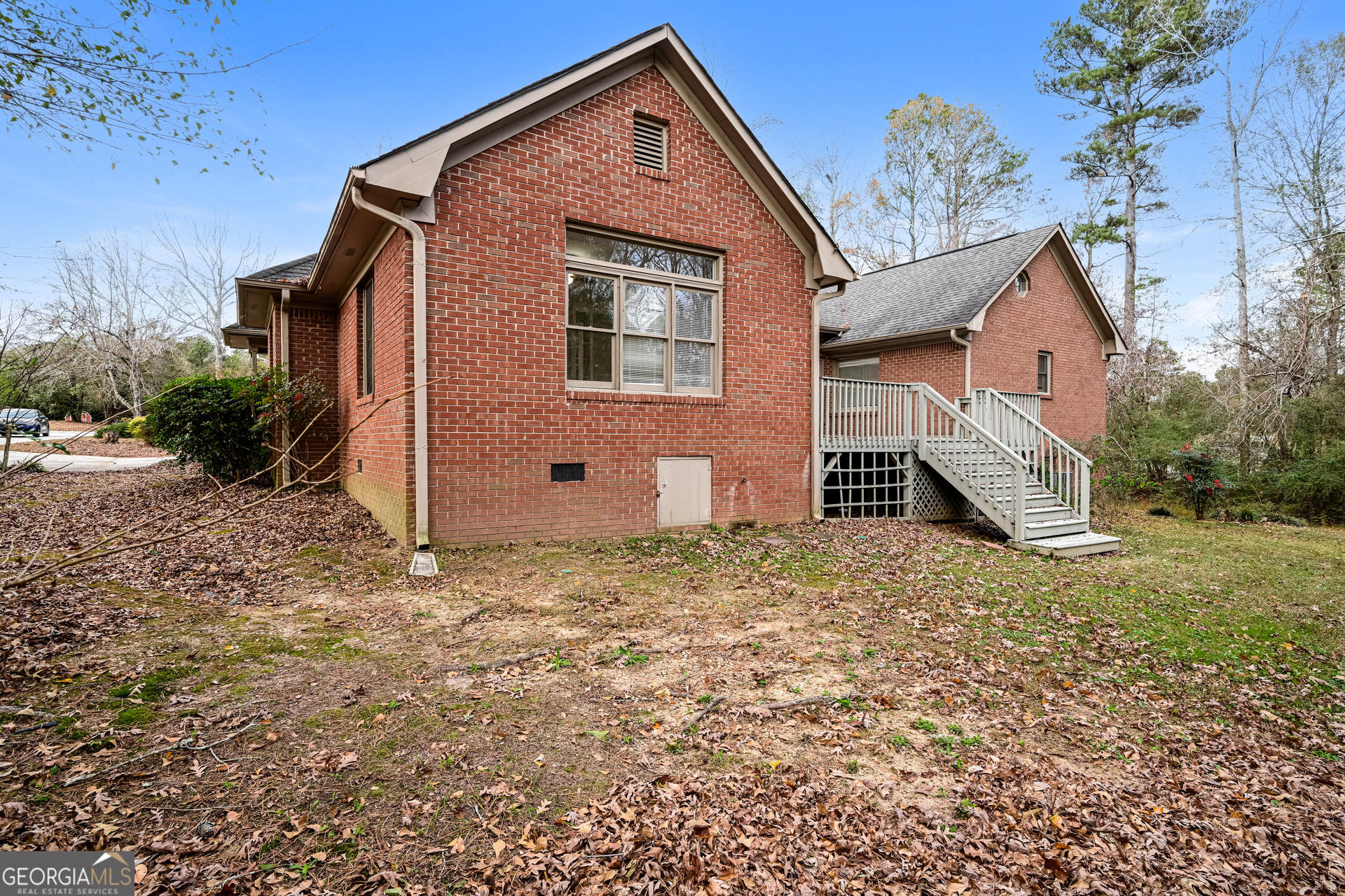 100 Red Maple Drive Hampton, GA 30228 - Photo 17 of 22 front view of a house with a yard
