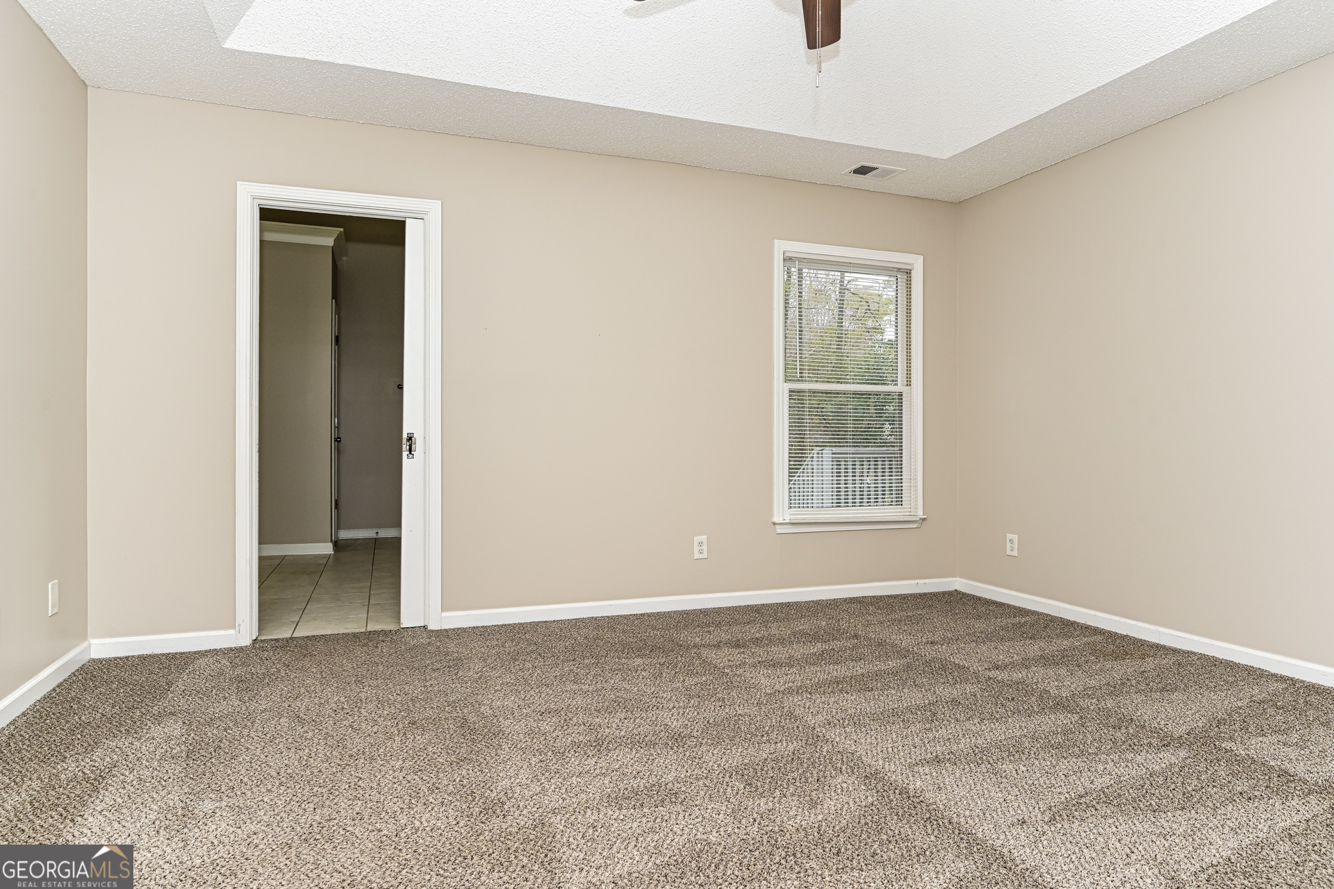 100 Red Maple Drive Hampton, GA 30228 - Photo 8 of 22 a view of an empty room with window